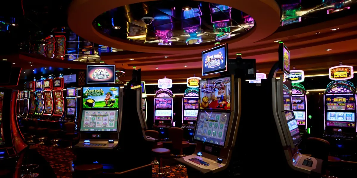 Casino floor with rows of illuminated slot machines at Casinorama or Casino Niagara
